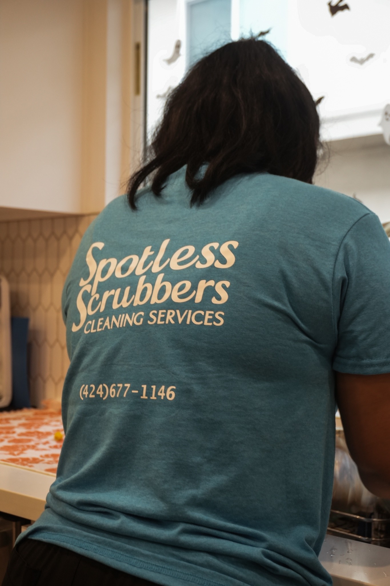 Spotless Scrubbers team member at work